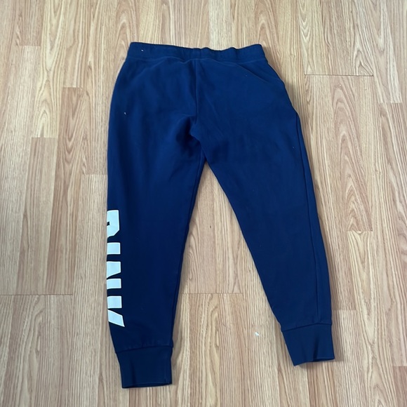 This is a PINK pair of blue sweatpants they ARE used - Picture 3 of 4